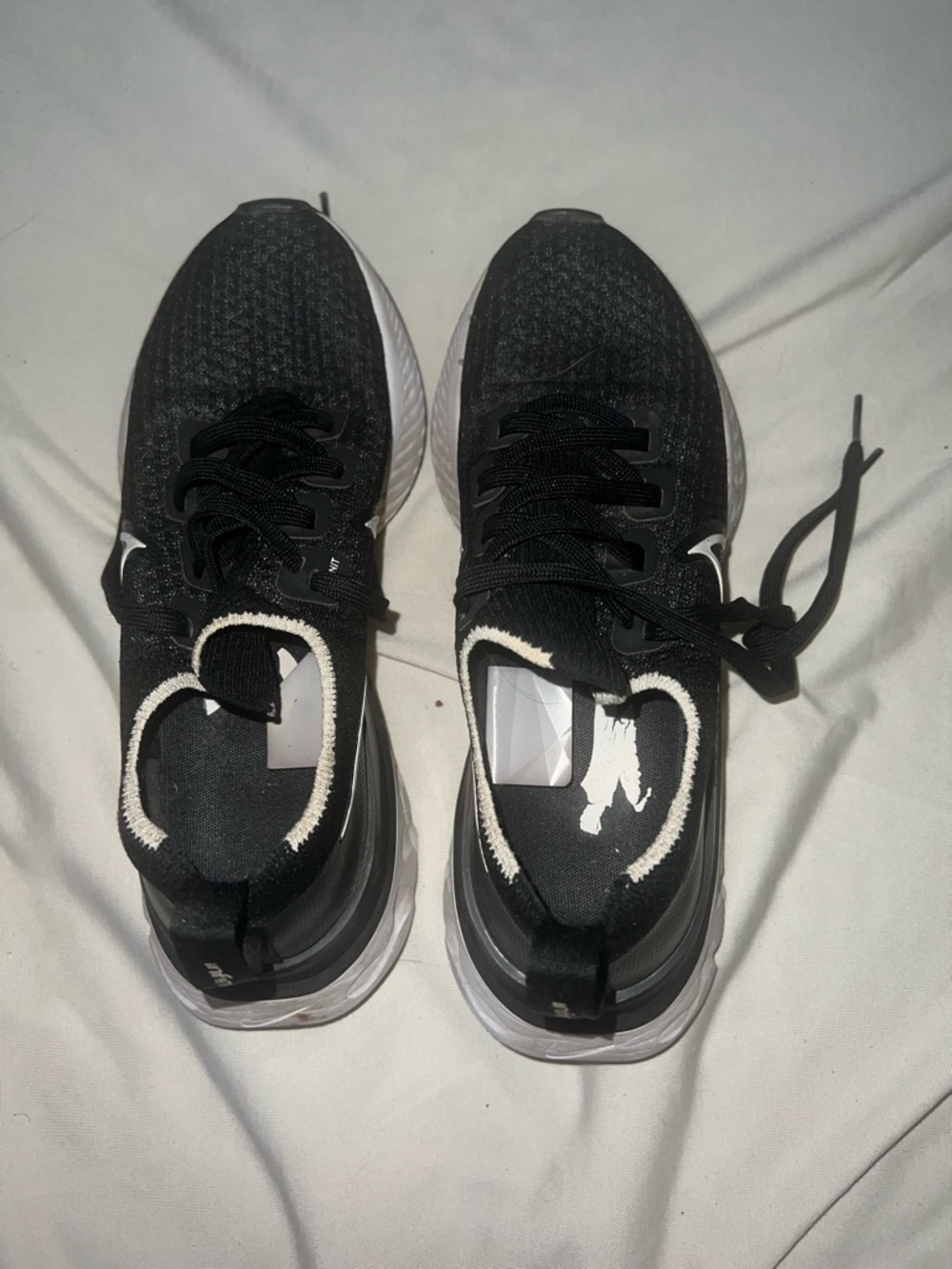 Nike Black and White Flyknit Women's Athletic Running Shoes - Picture 2 of 5